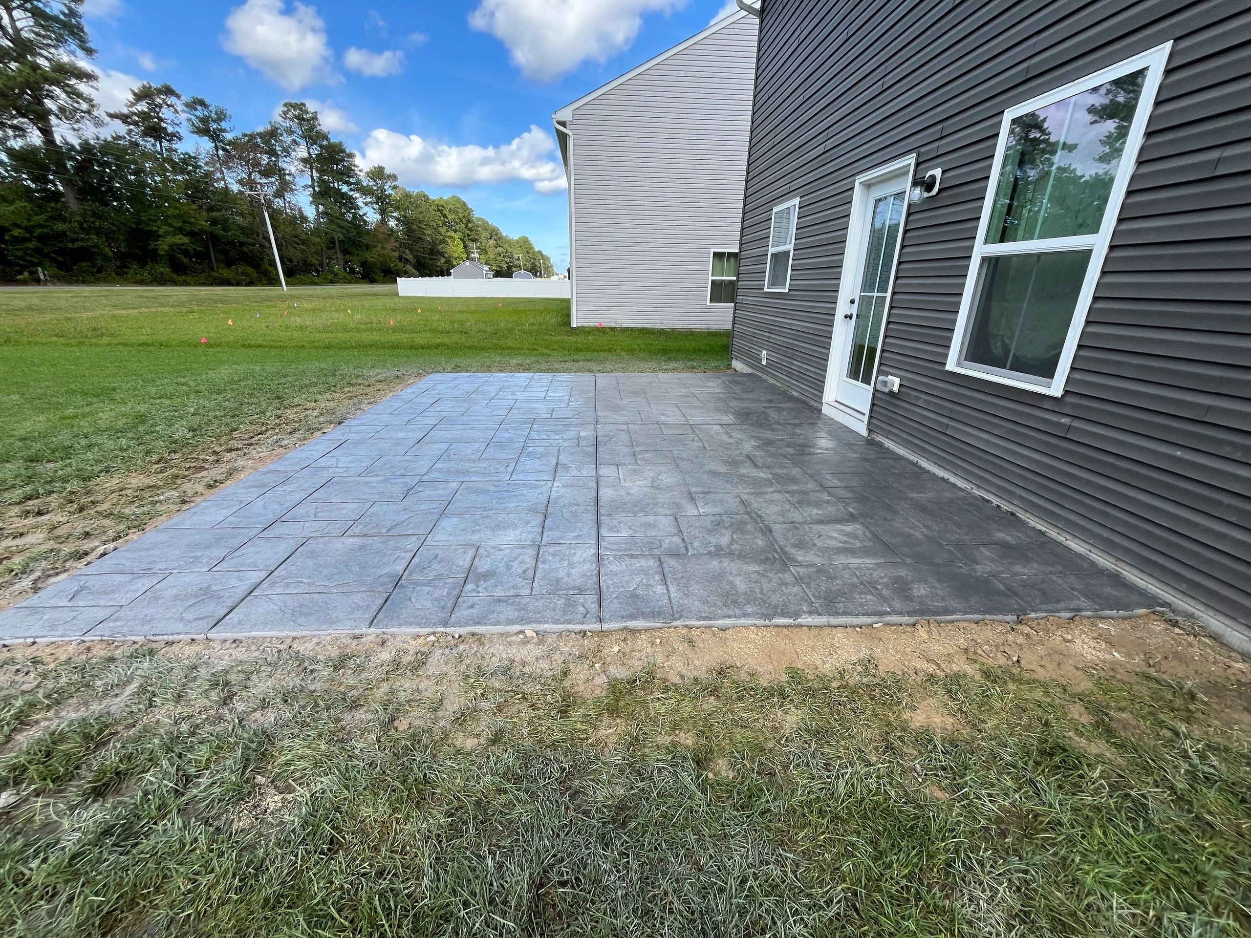 Stamped concrete patio modern house